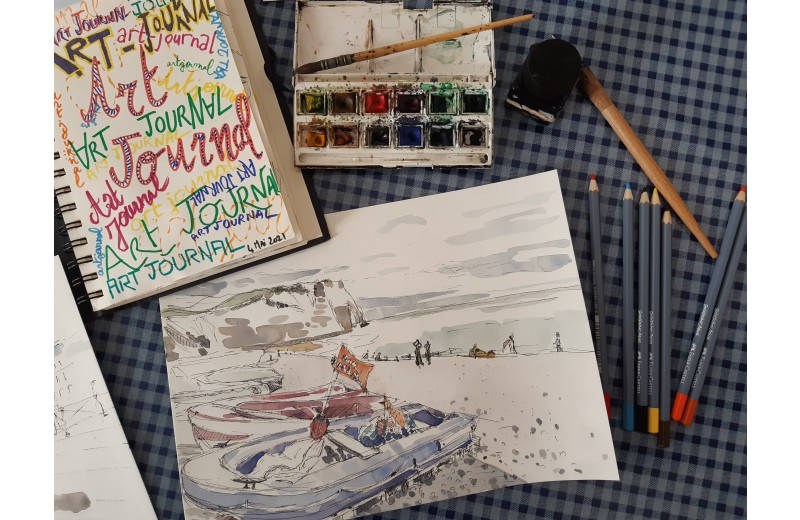 peinture de plage à l'aquarelle et boîte d'aquarelle